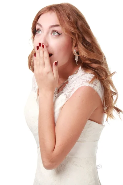 Surprised woman in white dress — Stock Photo, Image