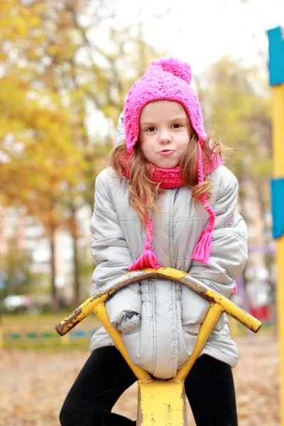 Menina no parque infantil — Fotografia de Stock