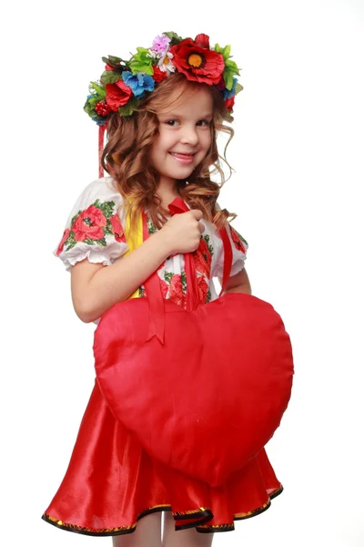 Mooi meisje met heldere rood hartsymbool — Stockfoto