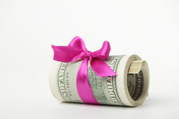 US dollar wrapped by ribbon Royalty Free Stock Photos