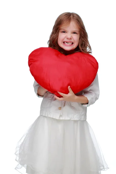 Little girl with a heart — Stock Photo, Image