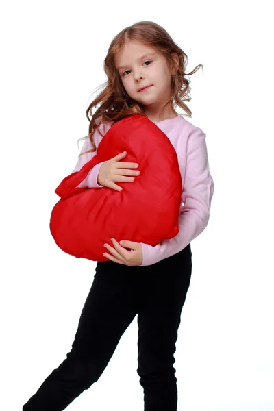 Little girl with a heart — Stock Photo, Image