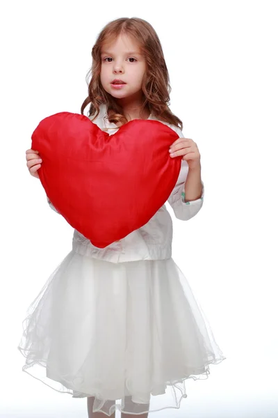 Little girl with a heart — Stock Photo, Image