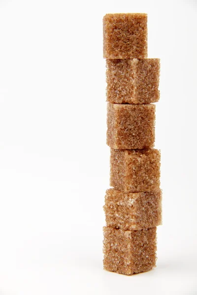 Hnědý cukr kostky — Stock fotografie