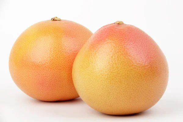 Grapefruit on a white background. — Stock Photo, Image