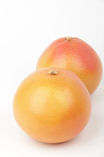 Grapefruit on a white background. — Stock Photo, Image