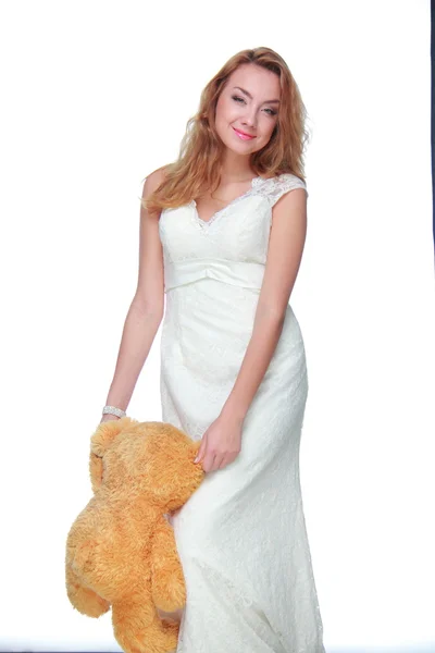 Schöne Frau mit einem Teddybär — Stockfoto