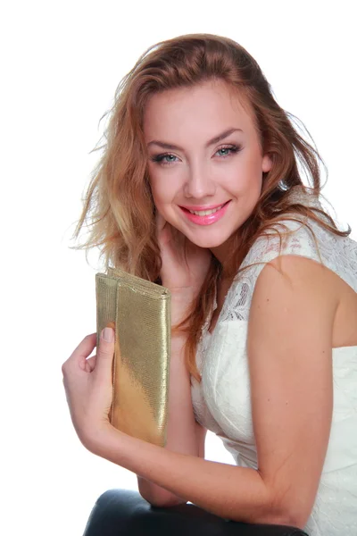 Mulher bonita com bolsa dourada — Fotografia de Stock