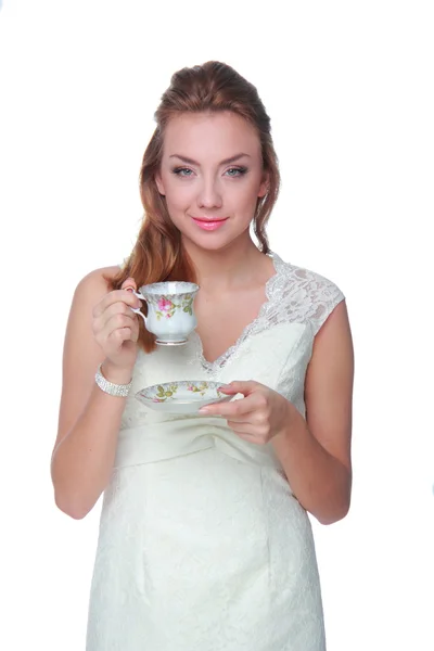 Жінка п'є з чашки кави — стокове фото