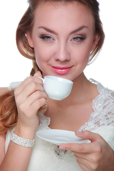 Žena pít z hrnečku kávy — Stock fotografie