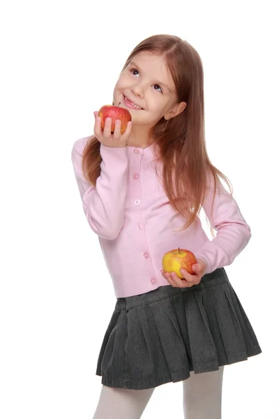 Little girl holding two apples — Stock Photo, Image