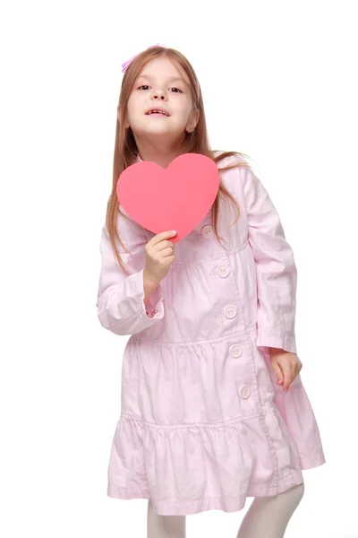 Little girl with a heart — Stock Photo, Image