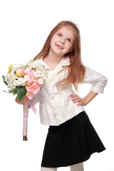 Little girl with a bouquet — Stock Photo, Image