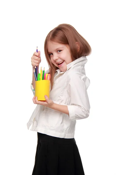 Little schoolgirl with pencils — Stock Photo, Image