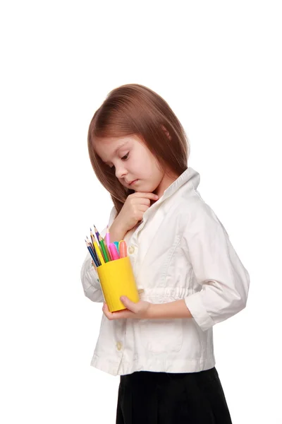 鉛筆と小さな女子高生 — ストック写真