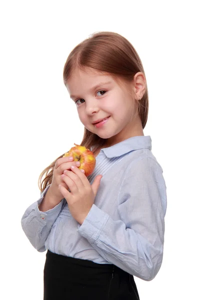 Petite fille mangeant une pomme — Photo