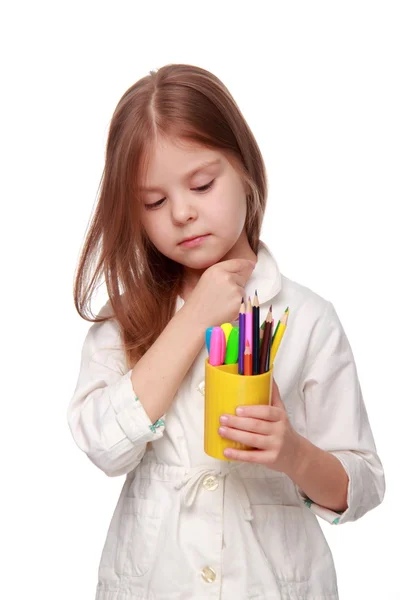 Little schoolgirl with pencils — Stock Photo, Image