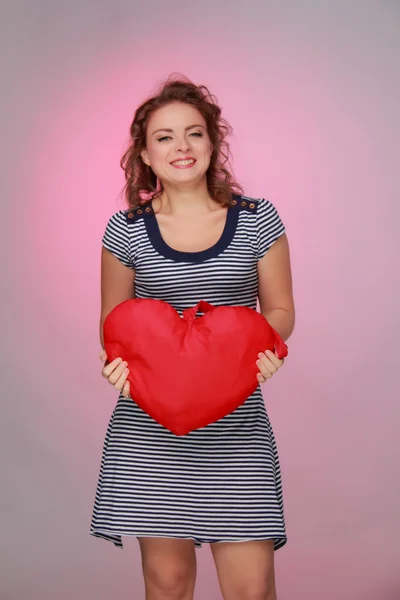 Woman with symbol of heart — Stock Photo, Image