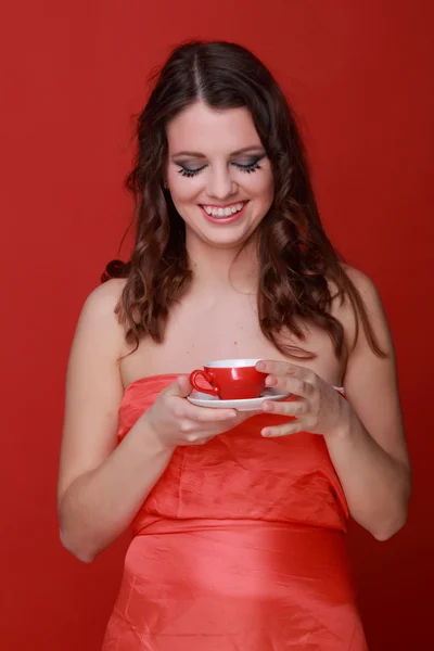 Mulher bonita com copo vermelho — Fotografia de Stock