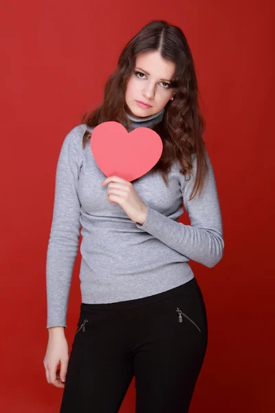 Girl with symbol of heart — Stock Photo, Image