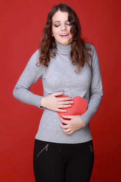 Fille avec le symbole du cœur — Photo