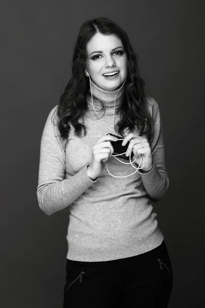 Menina com fones de ouvido — Fotografia de Stock