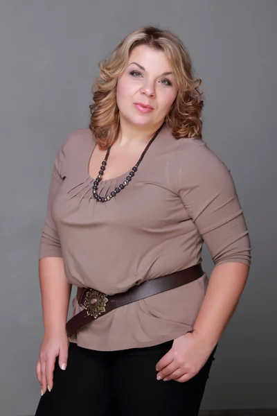 Portrait of a woman with a beautiful necklace — Stock Photo, Image