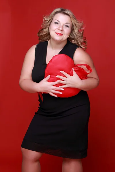 Woman with symbol of heart — Stock Photo, Image