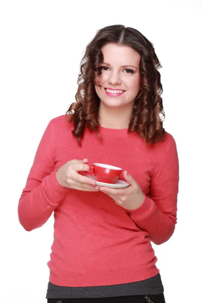 Hermosa chica con una taza roja — Foto de Stock