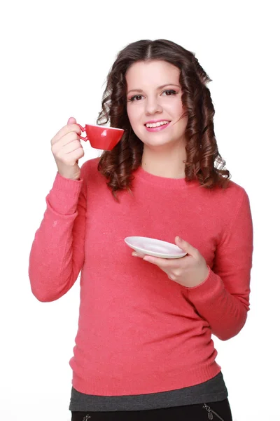 Hermosa chica con una taza roja — Foto de Stock