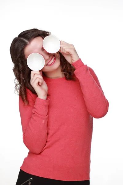 Hermosa chica con tazas rojas — Foto de Stock