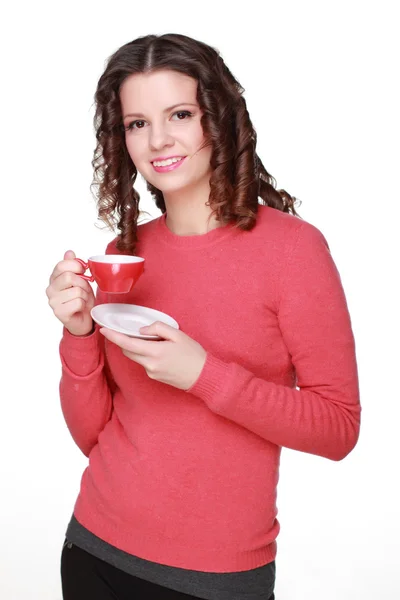 Hermosa chica con una taza roja — Foto de Stock