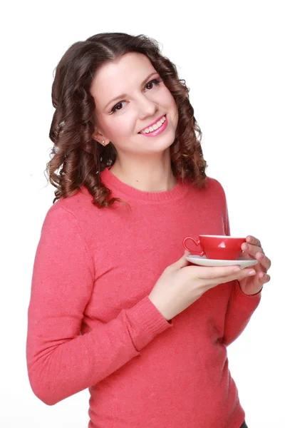 Schönes Mädchen mit einer roten Tasse — Stockfoto