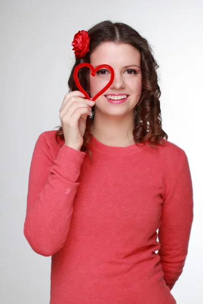 Menina com símbolo de coração — Fotografia de Stock