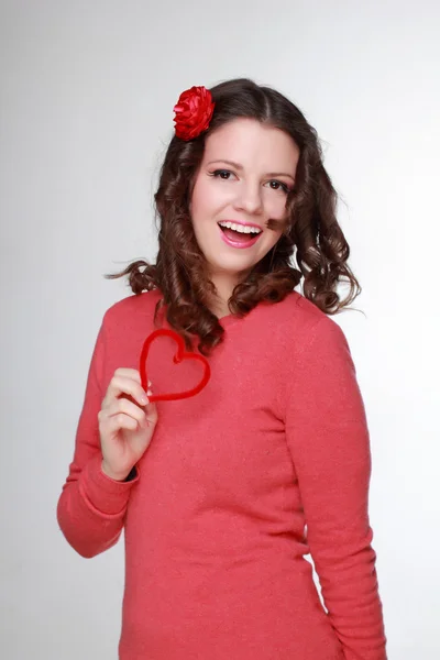 Girl with symbol of heart — Stock Photo, Image