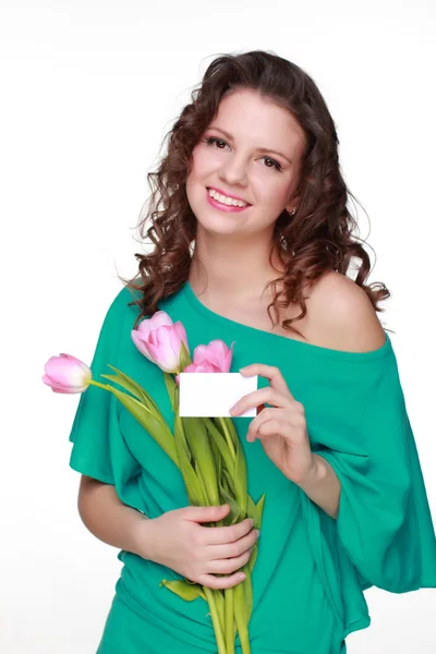 Krásná dívka s tulipány a vizitky — Stock fotografie