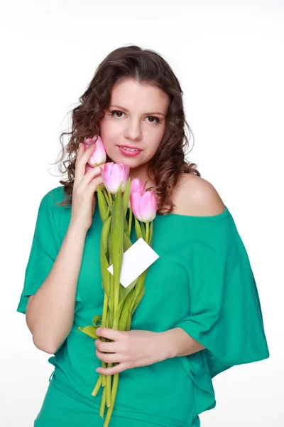 Beautiful girl with tulips and business card — Stock Photo, Image