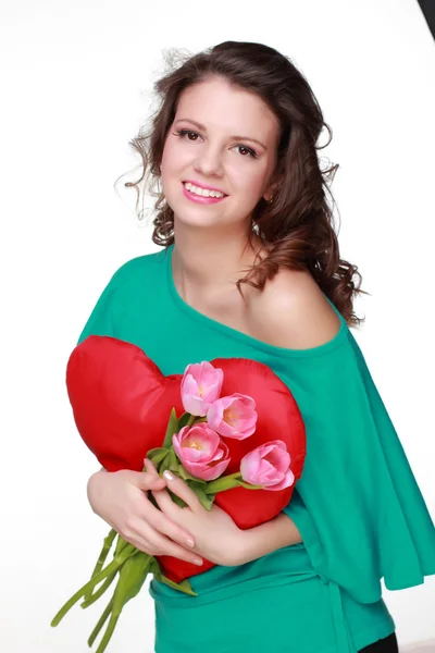 Porträtt av en flicka med tulpaner — Stockfoto