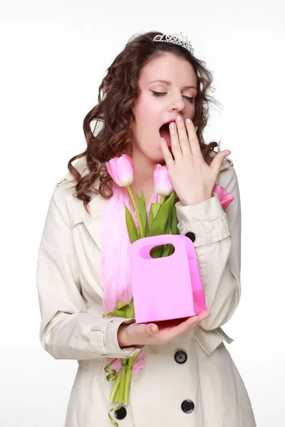 Girl with tulips and gift Royalty Free Stock Photos