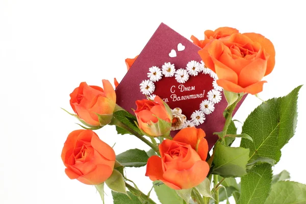 Τριαντάφυλλα με μια κάρτα ημέρα του Αγίου Βαλεντίνου — Φωτογραφία Αρχείου