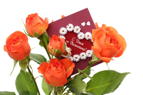 Τριαντάφυλλα με μια κάρτα ημέρα του Αγίου Βαλεντίνου — Φωτογραφία Αρχείου