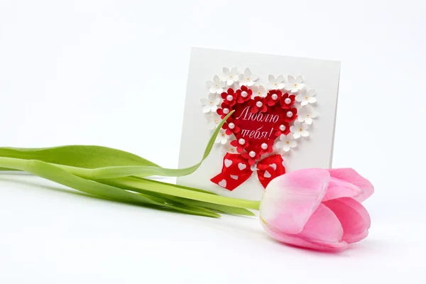 Tarjeta de felicitación y ramo de tulipanes — Foto de Stock