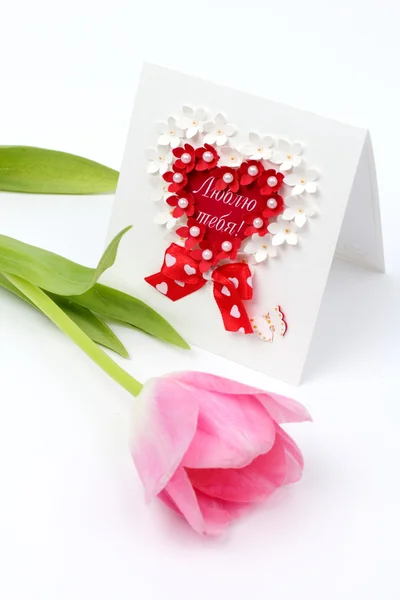 Tarjeta de felicitación y ramo de tulipanes — Foto de Stock