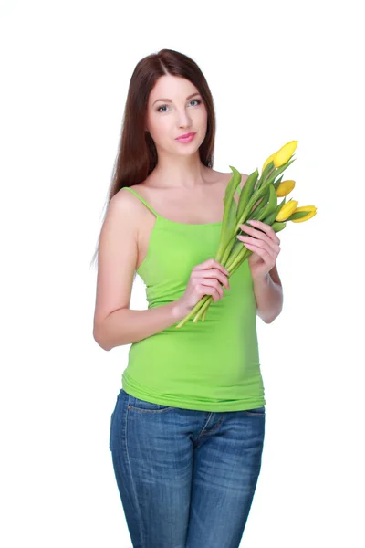 Happy girl with yellow tulips — Stock Photo, Image
