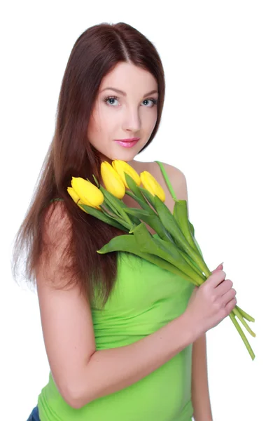 Menina feliz com tulipas amarelas — Fotografia de Stock