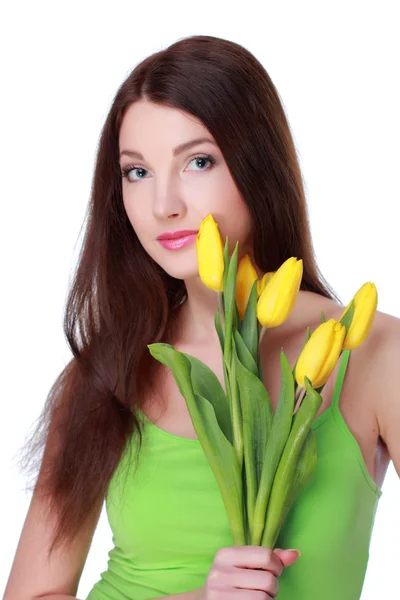 Glückliches Mädchen mit gelben Tulpen — Stockfoto