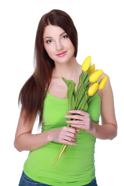 Glückliches Mädchen mit gelben Tulpen — Stockfoto