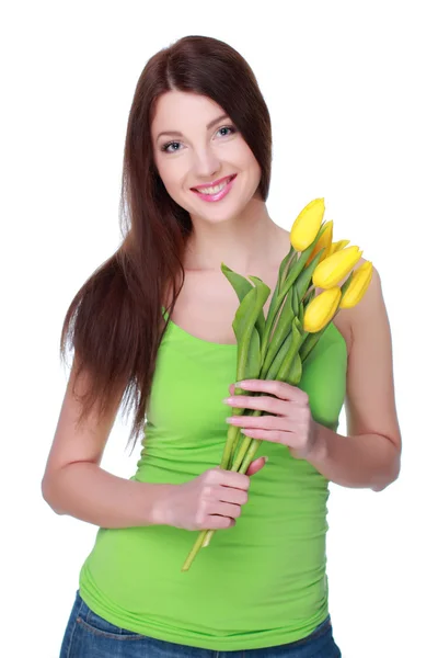 Happy girl with yellow tulips — Stock Photo, Image