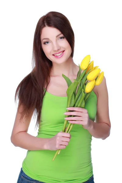 Happy girl with yellow tulips — Stock Photo, Image