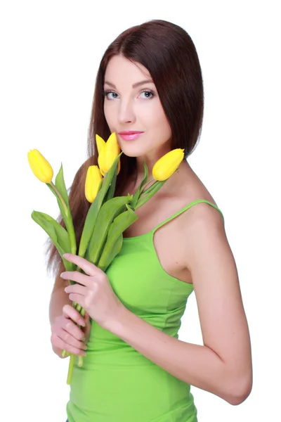 Happy girl with yellow tulips — Stock Photo, Image